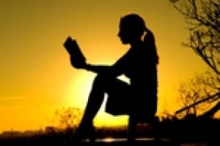 womanreadingsunset.jpg